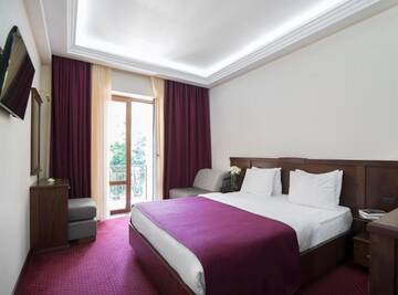 Фото номера Стандартный двухместный номер с 2 отдельными кроватями Отель Elegant Hotel &amp; Resort г. Цахкадзор 6