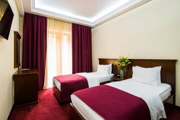 Фото номера Стандартный двухместный номер с 2 отдельными кроватями Отель Elegant Hotel &amp; Resort г. Цахкадзор 12