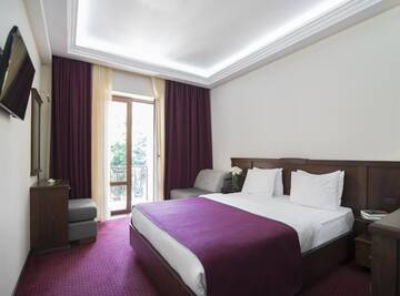 Фото номера Стандартный двухместный номер с 2 отдельными кроватями Отель Elegant Hotel &amp; Resort г. Цахкадзор 2