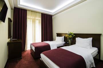 Фото номера Стандартный двухместный номер с 2 отдельными кроватями Отель Elegant Hotel &amp; Resort г. Цахкадзор 5