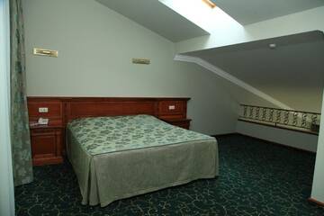 Фото номера Двухуровневый семейный номер Отель Hotel Russia г. Цахкадзор 4