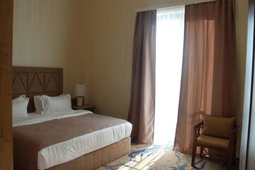 Фото номера Полулюкс с видом на горы Отель Aurora Resort Tsaghkadzor г. Цахкадзор 4