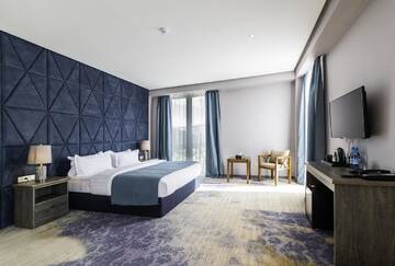 Фото номера Двухместный номер Делюкс с 1 кроватью Отель Aurora Resort Tsaghkadzor г. Цахкадзор 5