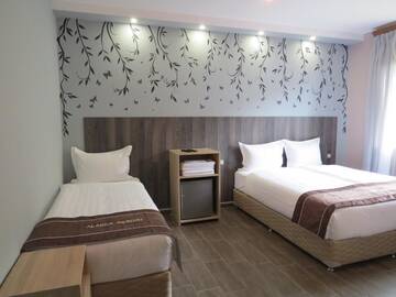 Фото номера Семейный номер Делюкс Отель Alaska Resort г. Цахкадзор 13