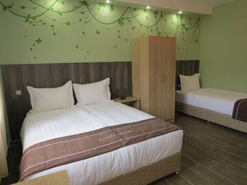 Фото номера Семейный номер Делюкс Отель Alaska Resort г. Цахкадзор 17