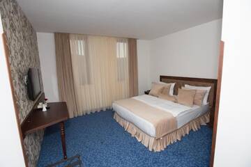 Фото номера Стандартный двухместный номер с 1 кроватью Отель Faria Boutique Hotel г. Цахкадзор 8